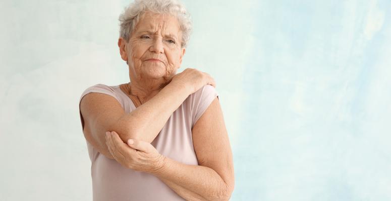 Senior woman with elbow pain