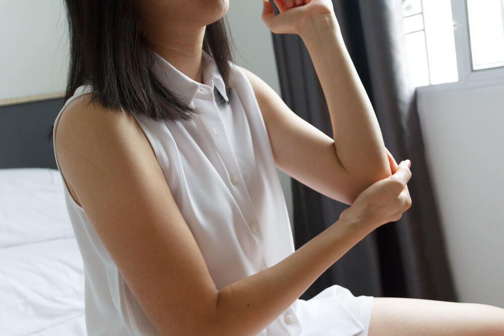 how to sleep with tennis elbow