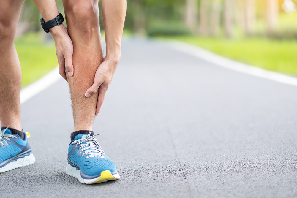pain in lower leg above ankle when running