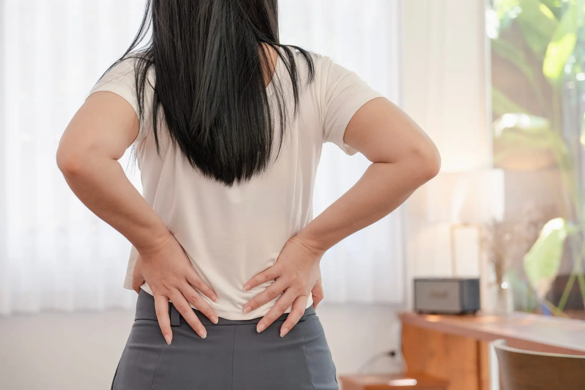 What Does SI Joint Pain Feel Like? AdobeStock 1183484936 scaled What Does SI Joint Pain Feel Like?
